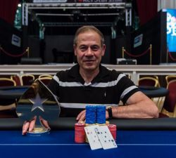 PokerStars Founder with the UKIPT Trophy